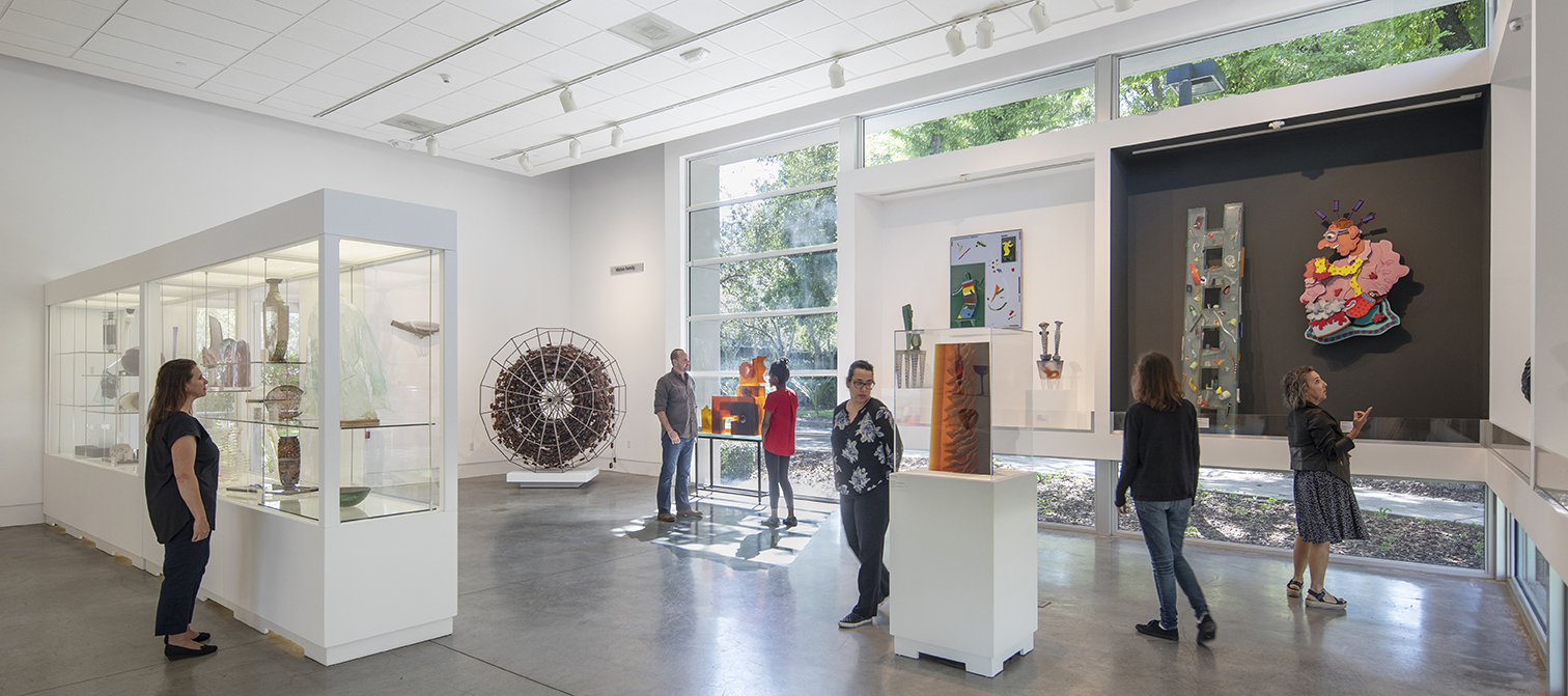 interior view of palley pavillion with people looking at artwork