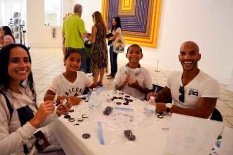 image of family at a table doing art