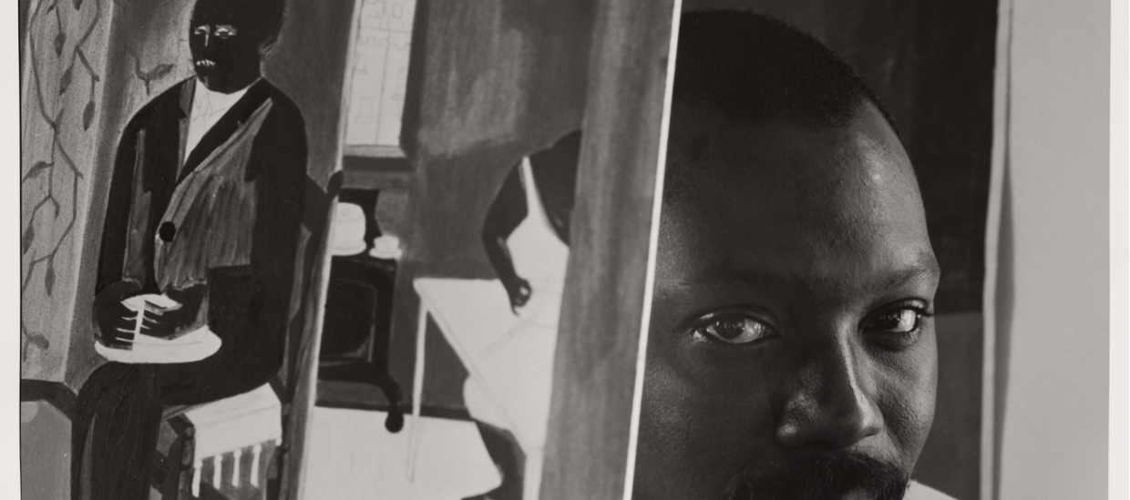 photograph of artist jacob lawrence by Arnold Newman, black and white in artist studio
