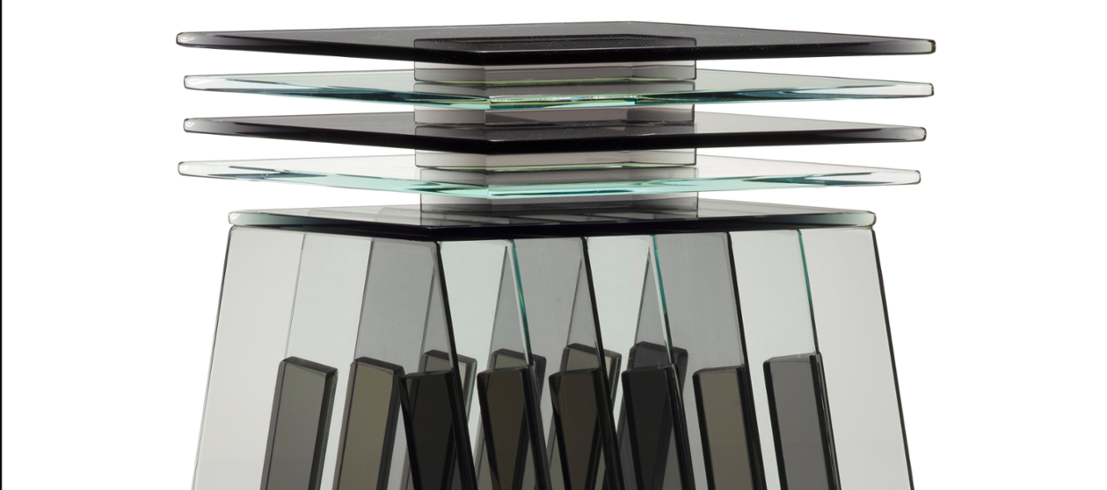 abstract glass sculpture, geometric shapes, frosted grey in color